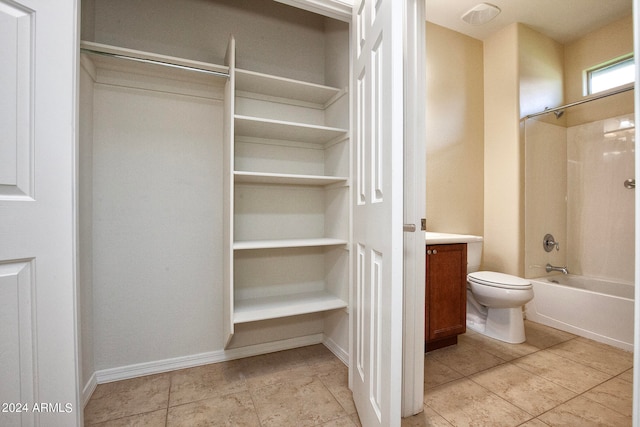 full bathroom featuring tile flooring, vanity, toilet, and shower / bathing tub combination