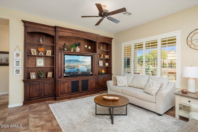 living room featuring ceiling fan