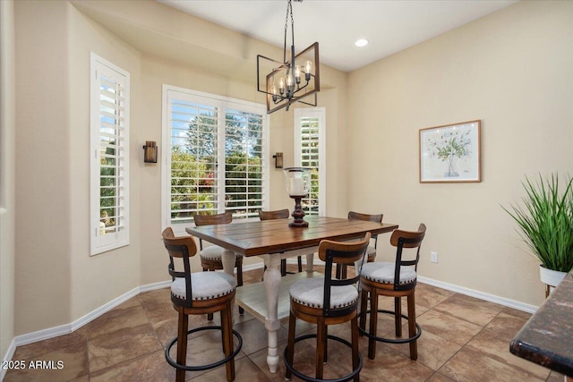 dining room featuring a chandelier