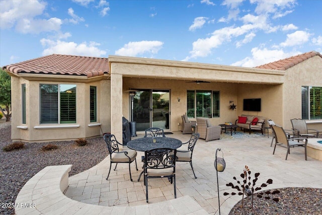 back of house featuring an outdoor hangout area and a patio area