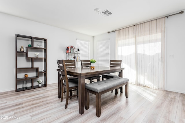 dining area featuring light hardwood / wood-style flooring