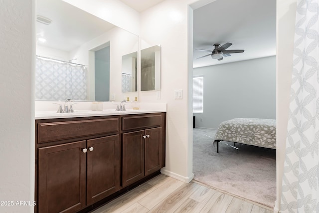 bathroom with vanity and ceiling fan