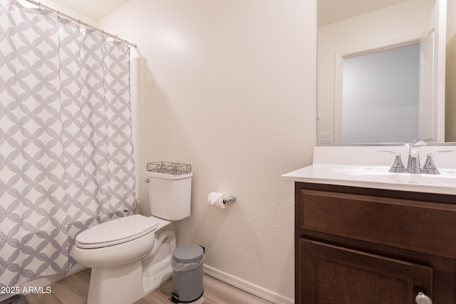 bathroom with a shower with curtain, wood-type flooring, toilet, and vanity