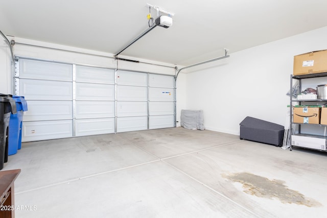 garage featuring a garage door opener