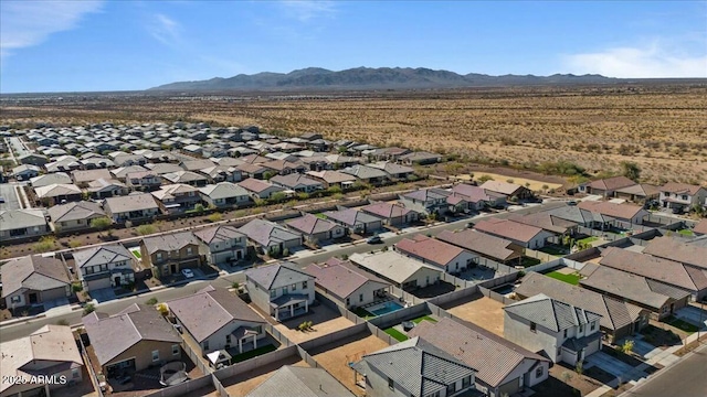 drone / aerial view featuring a mountain view