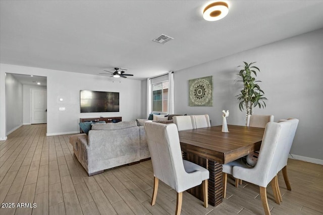 dining area with ceiling fan