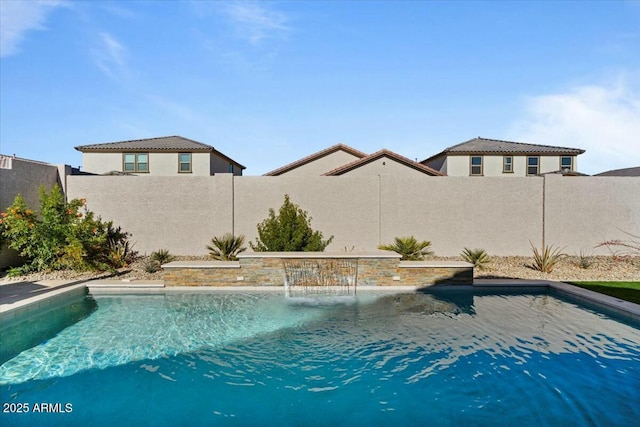 view of swimming pool featuring pool water feature