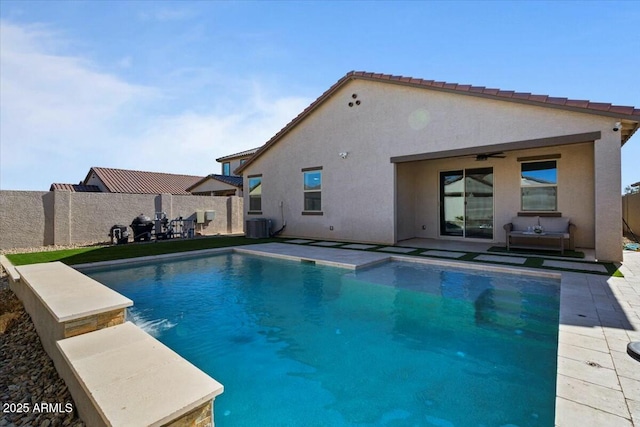 view of swimming pool featuring central AC and a patio