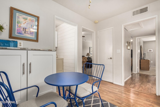 sitting room featuring light hardwood / wood-style floors