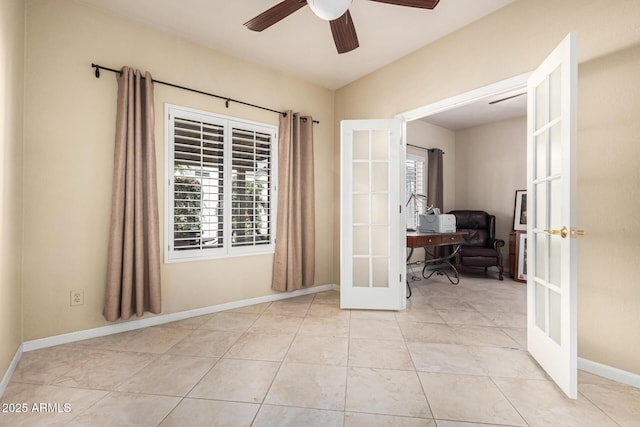 unfurnished room featuring french doors, ceiling fan, and light tile patterned flooring