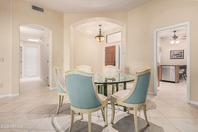 dining area featuring light tile patterned floors