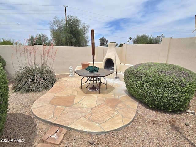 view of patio featuring a fenced backyard