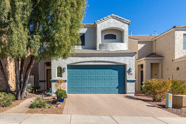 view of front of home with a garage