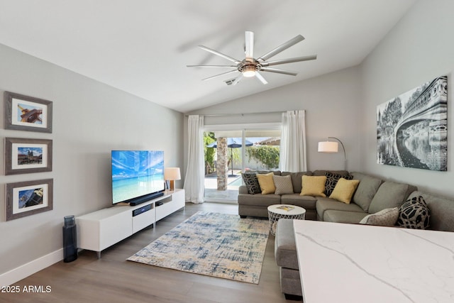 1057 W Laurel Ave, Gilbert, AZ 85233 - living room featuring lofted ceiling, ceiling fan, and dark wood finished floors