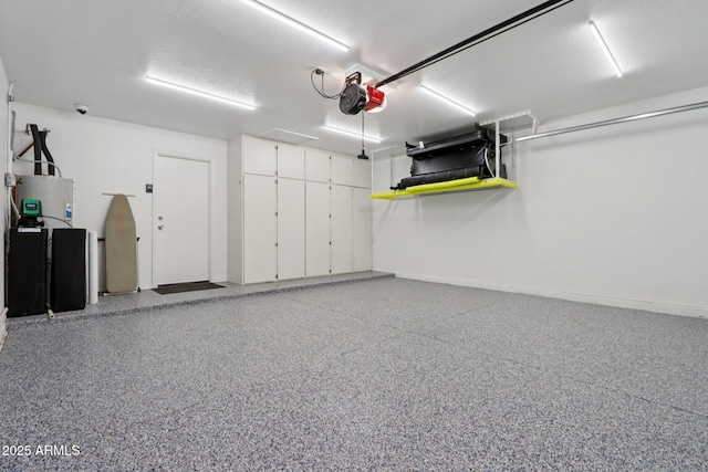 1057 W Laurel Ave, Gilbert, AZ 85233 - garage with a garage door opener and electric water heater