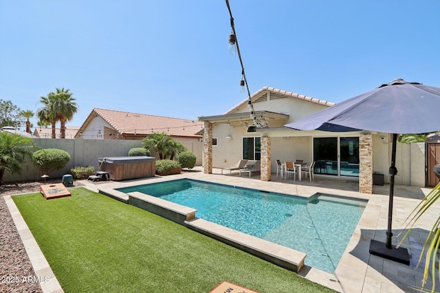 1057 W Laurel Ave, Gilbert, AZ 85233 - view of swimming pool featuring a hot tub, a patio area, and a fenced backyard