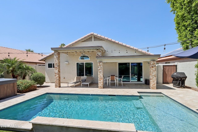 1057 W Laurel Ave, Gilbert, AZ 85233 - back of property featuring a patio and stucco siding