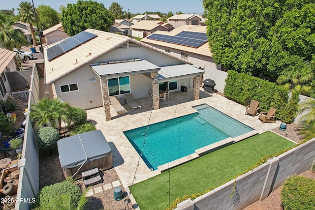 1057 W Laurel Ave, Gilbert, AZ 85233 - view of pool with a hot tub, a patio area, a fenced backyard, and grilling area
