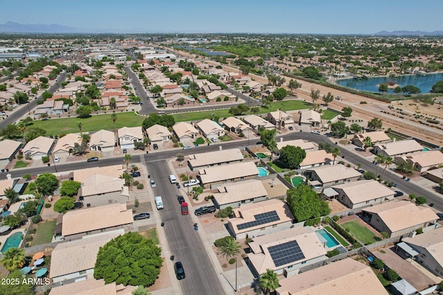 1057 W Laurel Ave, Gilbert, AZ 85233 - aerial perspective of suburban area with a water and mountain view