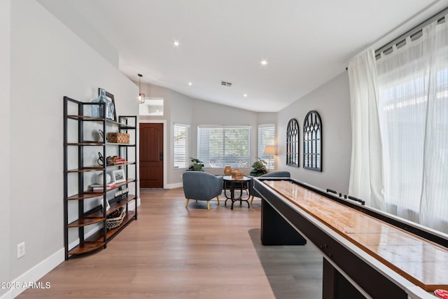 1057 W Laurel Ave, Gilbert, AZ 85233 - game room with vaulted ceiling, light wood-style floors, and recessed lighting