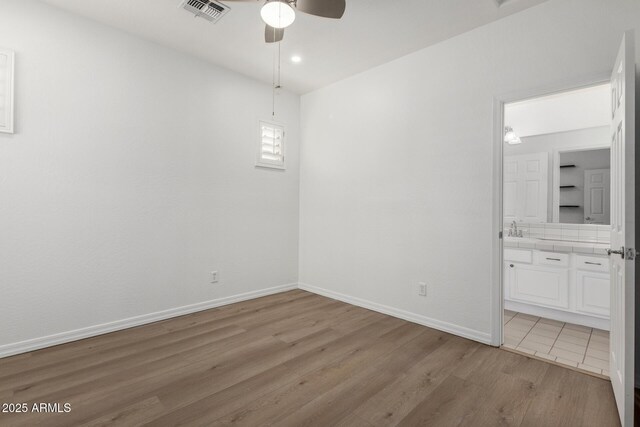 mudroom with dark tile patterned floors