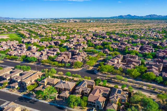 drone / aerial view featuring a mountain view