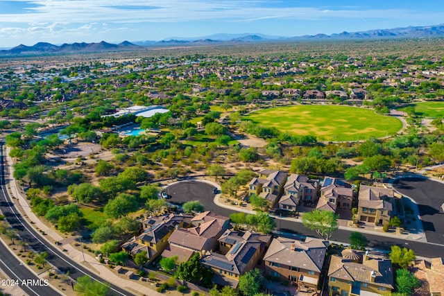 birds eye view of property featuring a mountain view