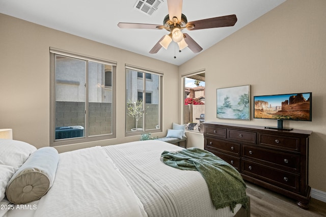 bedroom with visible vents, baseboards, ceiling fan, lofted ceiling, and dark wood-style floors