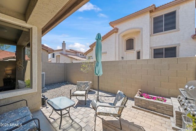view of patio / terrace with a fenced backyard
