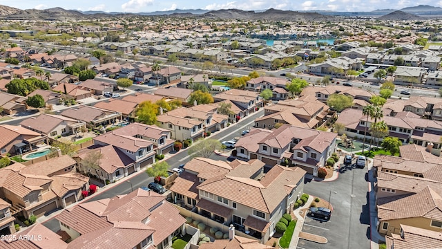 birds eye view of property with a residential view and a mountain view