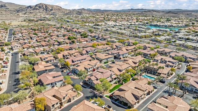bird's eye view featuring a residential view and a water and mountain view