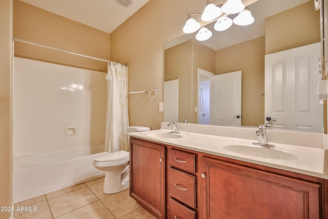 full bath featuring tile patterned floors, toilet, a notable chandelier, and a sink