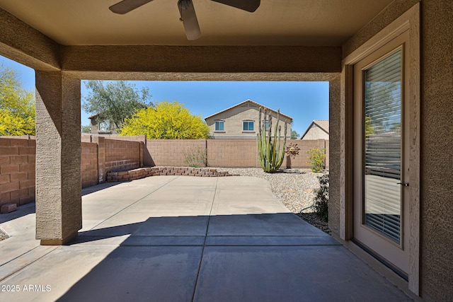 view of patio featuring ceiling fan and a fenced backyard