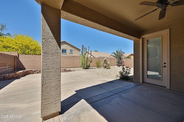 view of patio with ceiling fan and a fenced backyard