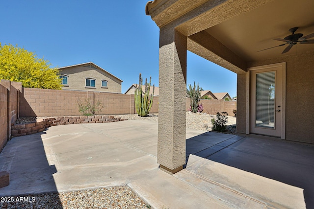 view of patio / terrace with a ceiling fan and a fenced backyard