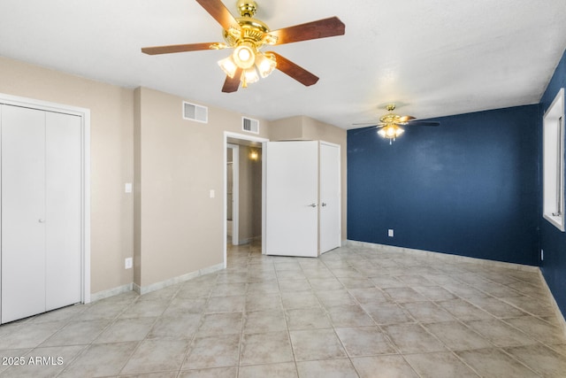 unfurnished bedroom with ceiling fan