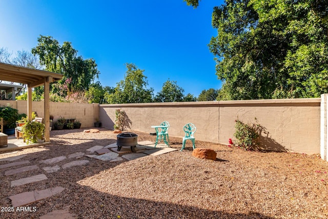 view of patio / terrace featuring a fire pit