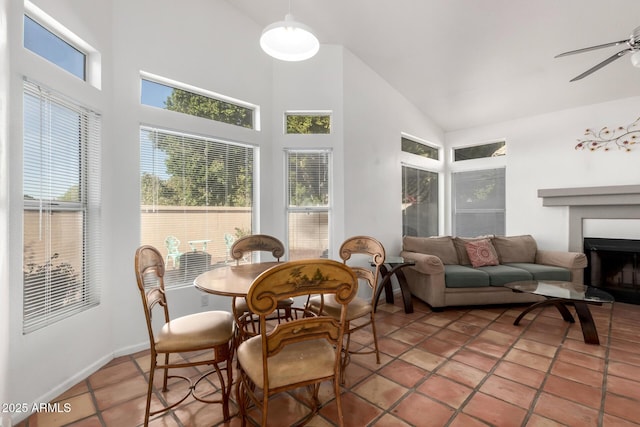 sunroom featuring ceiling fan