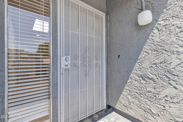 220 N 22nd Pl Unit 2036, Mesa, AZ 85213 - doorway to property with stucco siding