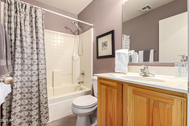 full bathroom with shower / bath combo with shower curtain, toilet, and vanity