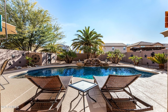 view of pool featuring a patio area