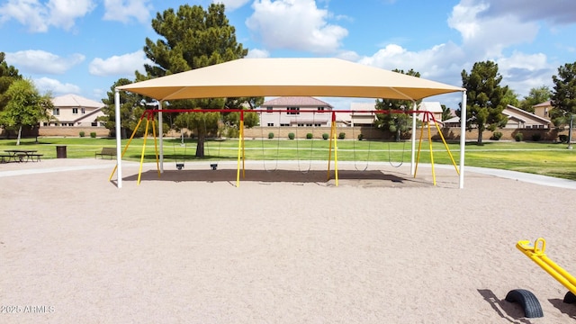 view of jungle gym featuring a yard