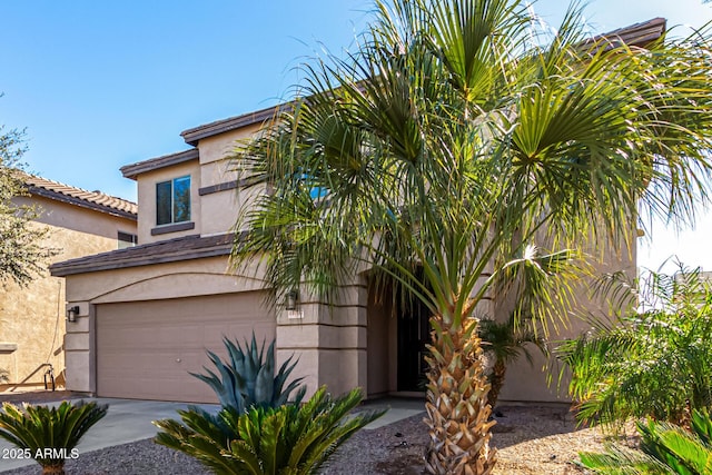 view of front of property with a garage