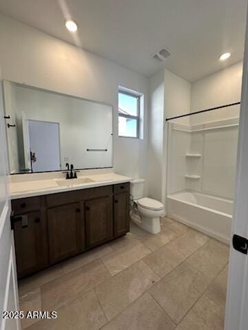 full bathroom featuring bathtub / shower combination, vanity, and toilet