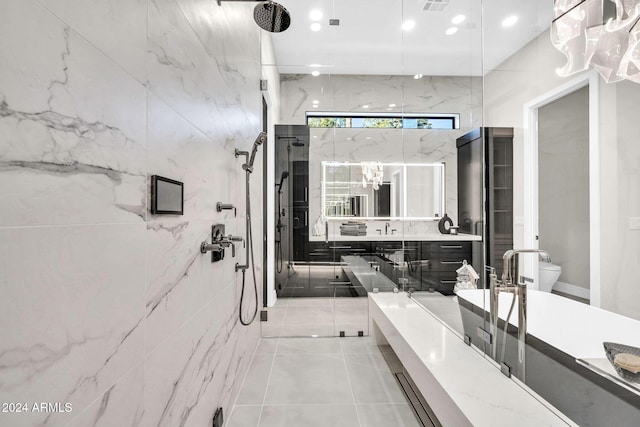 bathroom featuring vanity, toilet, tile patterned floors, and walk in shower