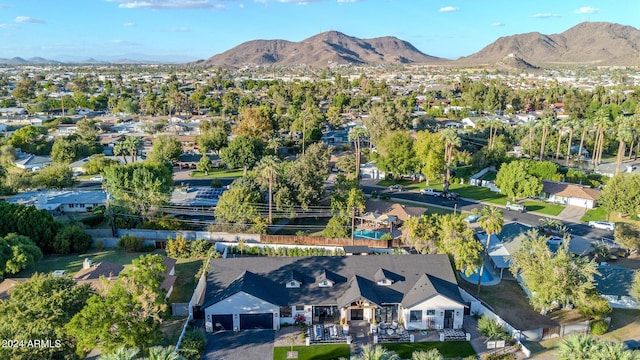 birds eye view of property with a residential view and a mountain view