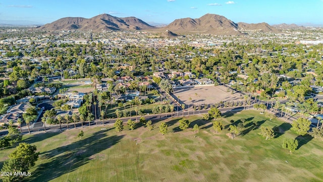 birds eye view of property with a mountain view