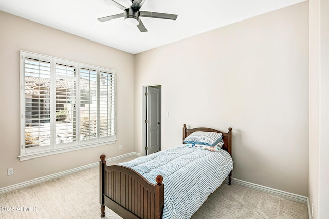 bedroom with carpet flooring, ceiling fan, and baseboards