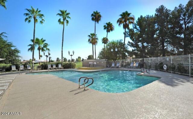 view of pool featuring a patio