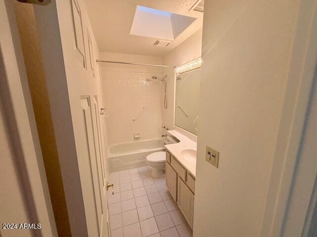 full bathroom featuring tile patterned floors, washtub / shower combination, vanity, and toilet